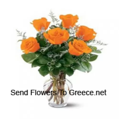 7 Żółtych Róż z Trochą Paproci w Szklanej Wazie