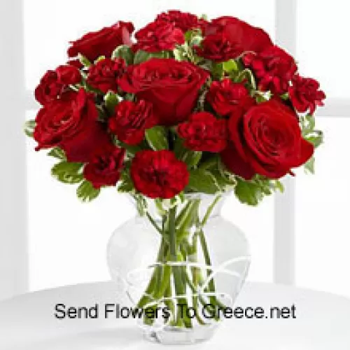 9 Trandafiri roșii și 8 Garoafe roșii într-un vas de sticlă