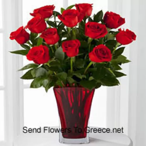 11 ורדים אדומים עם קצת פרנים בצנצנת