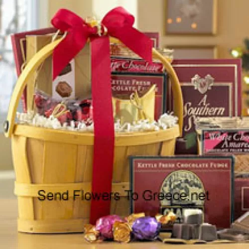 Een klassieke combinatie van de lekkerste luxe chocolaatjes maakt deze cadeaumand perfect voor iedereen die van zoetigheid houdt. Bevat Italiaanse Chocolade Truffels, knapperige Amandel Roca, Witte Chocolade Amaretto Wafers, Chocolade Fudge, romige Melkchocolade, Belgische Chocolaatjes en diverse individueel verpakte Godiva Chocolaatjes. We verpakken alles in een herbruikbare handmand en verzenden uw cadeau rechtstreeks naar de ontvanger. (Let op: Wij behouden ons het recht voor om elk product te vervangen door een geschikt product van gelijke waarde in geval van niet-beschikbaarheid van een bepaald product)