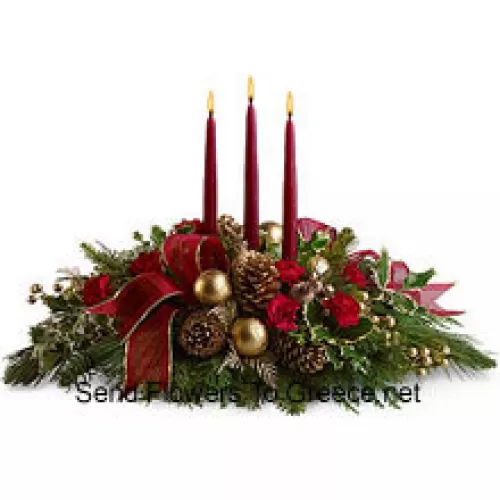 Red miniature carnations, pinecones, golden ornament balls, faux berries and assorted fresh evergreens  accented with a wired ribbon are arranged in a low dish with three red taper candles. (Please Note That We Reserve The Right To Substitute Any Product With A Suitable Product Of Equal Value In Case Of Non-Availability Of A Certain Product)